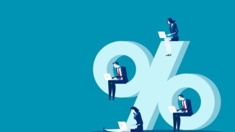 Financial advisor discussing investment report with a couple in an office, focusing on fees and other crucial investment fund factors.