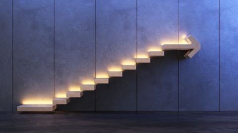 Wealth manager working at a modern desk, symbolizing transparency and fairness in private banking services.