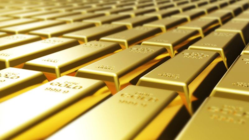 Close-up of gold bars symbolising investment options in metal accounts and physical storage.