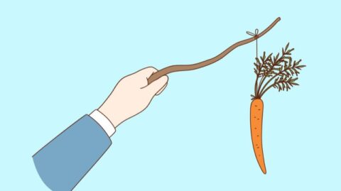 Illustration einer Hand, die eine Karotte auf einem Stock hält, als Symbol für die Motivation von RM in der Führung von Privatbanken
