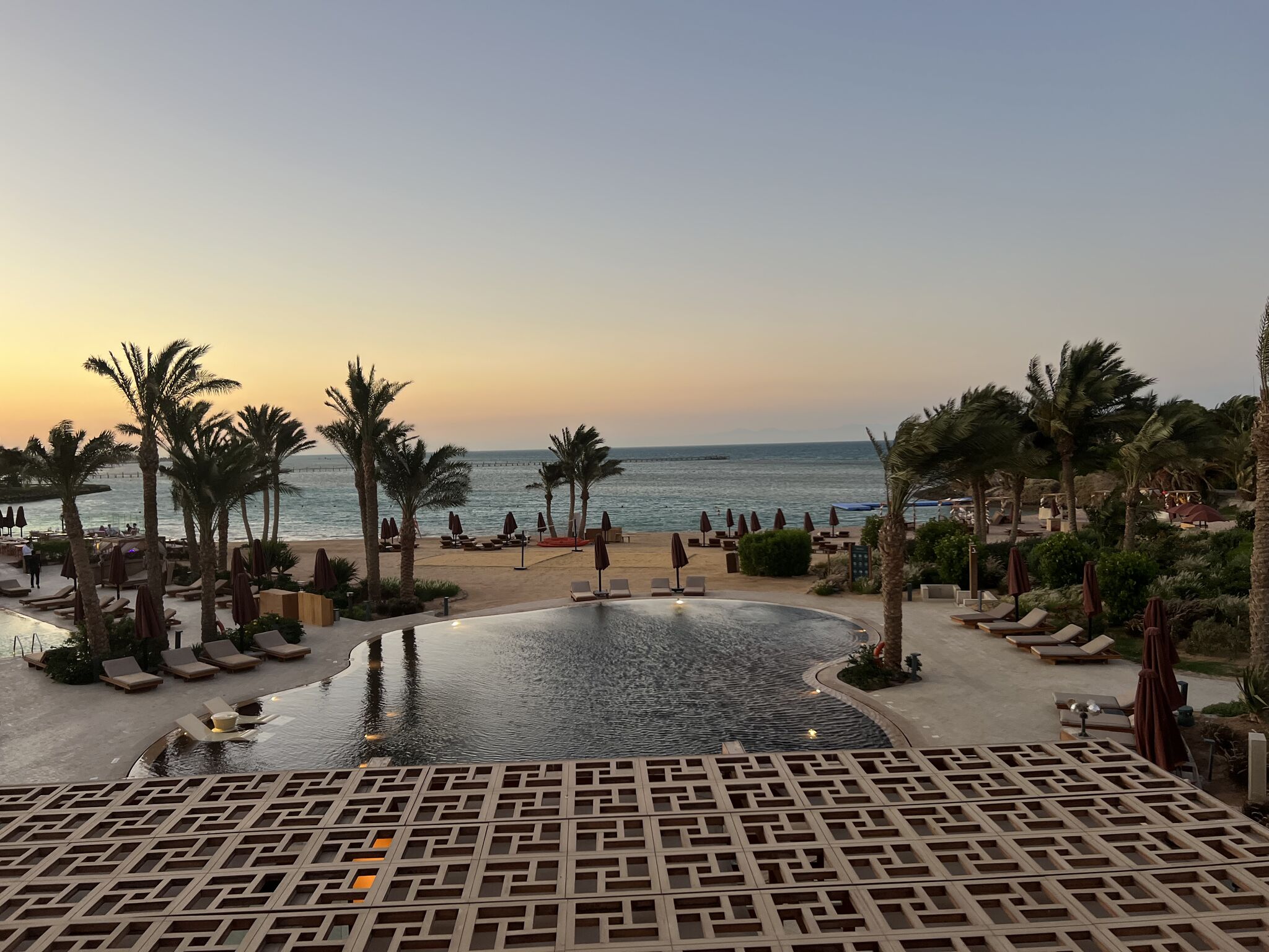 Sunset at El Gouna beach resort representing visionary design and structured living, echoing Swiss wealth management values.