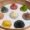 Assorted colourful dumplings in bamboo steamer, symbolising variety and choice in open architecture investment models