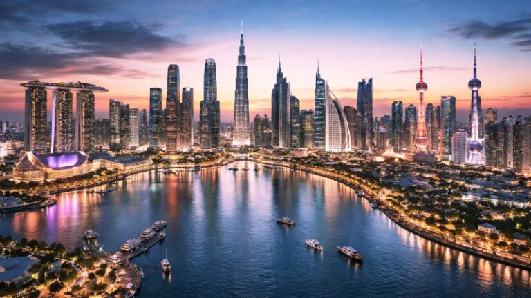 Asian city skyline at dusk reflecting in the harbour